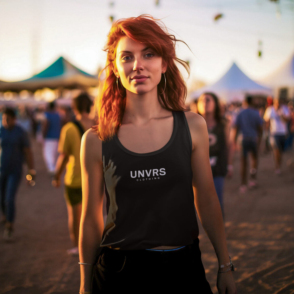 Female model styled in a UNVRS loose-fit tank top, designed for a casual yet edgy look. The sleeveless silhouette and soft fabric offer a breezy, comfortable feel, perfect for warm days or layering over sports bras. Featuring subtle branding, this piece effortlessly blends athletic appeal with Ibiza’s vibrant streetwear culture.